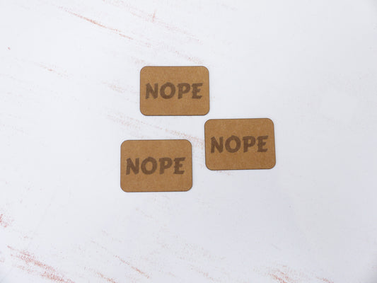 Zierteile aus SnapPap- "NOPE"